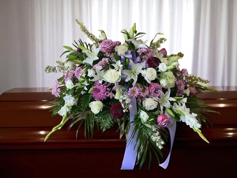 Whispers of Love Casket Flowers